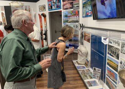 Attendees look over displays at the opening of the USA Water Ski and Wake Sports Foundation Hall of Fame Museum
