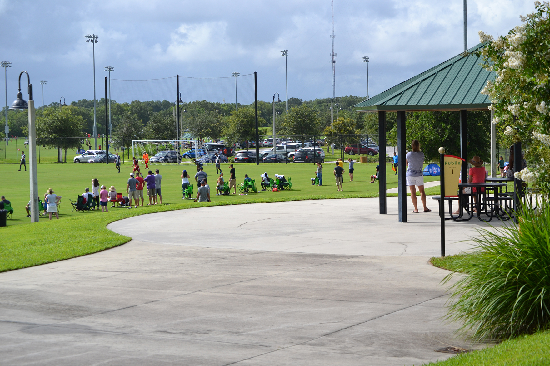 Fans watch a soccer game at the Lake Myrtle Sports Park