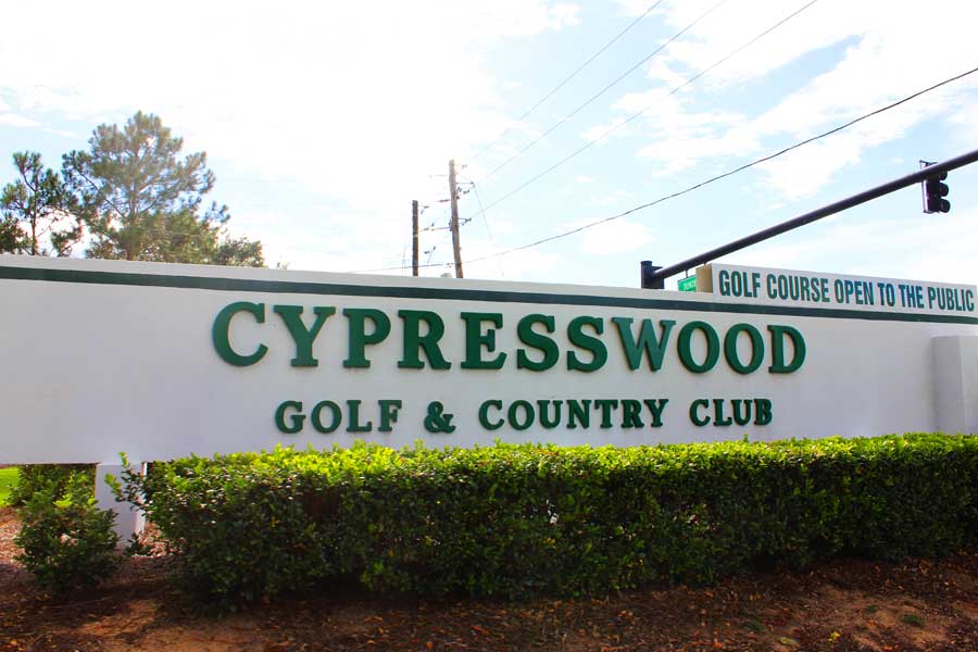 The sign in front of the Cypresswood Golf and Country Club