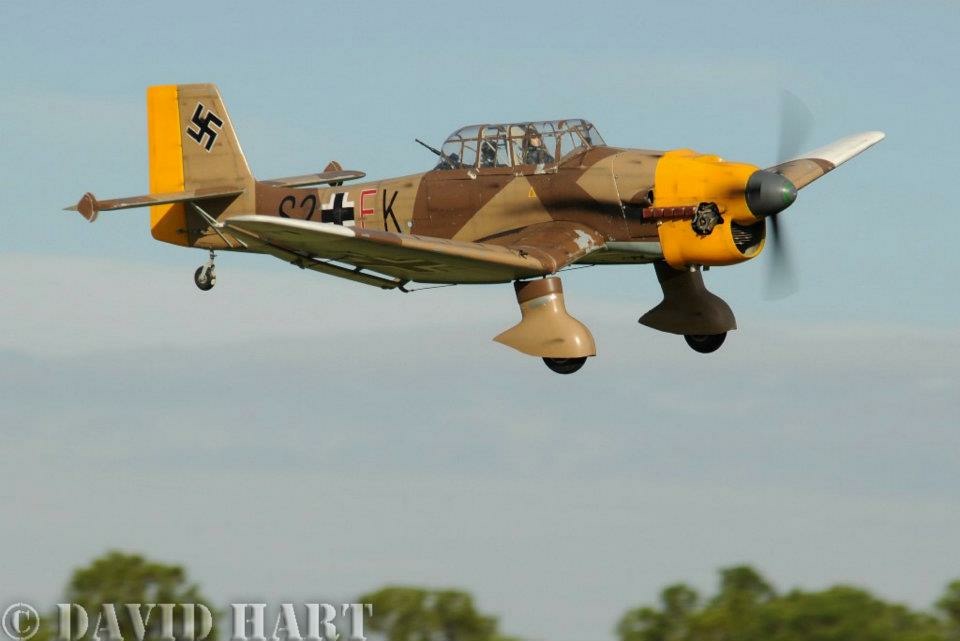 A replica warplane flies in the Florida skies during the 12 O'Clock High event